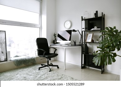 Interior Of Room With Comfortable Designer Workplace