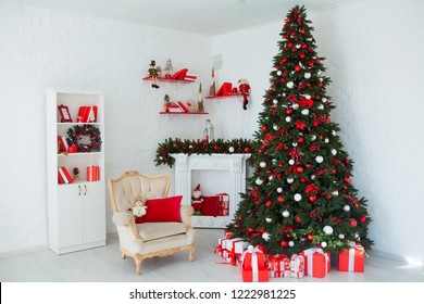 Interior Room Decorated In Christmas Style. No People. Home Comfort Of Modern House. Xmas Tree And Fireplace