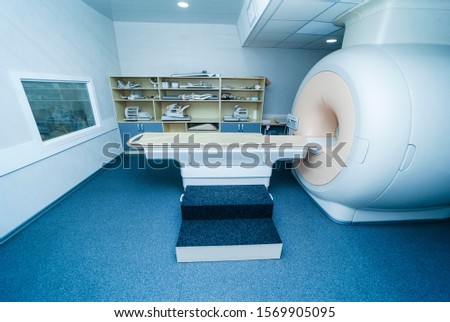 Interior of room with MRI machine.