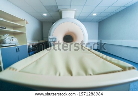 Interior of room with MRI machine.