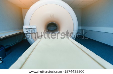 Interior of room with MRI machine.