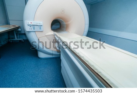 Interior of room with MRI machine.
