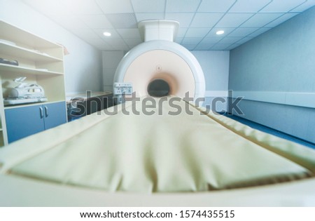 Interior of room with MRI machine.