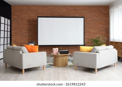 Interior of room with sofas, table and projector screen