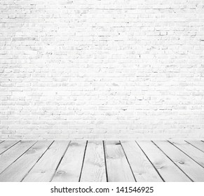 Interior Room With White Brick Wall And Wooden Floor 