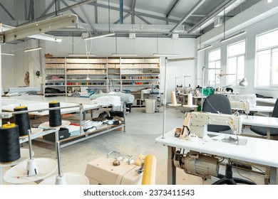Interior of a sewing warehouse of furniture factory with equipment and materials