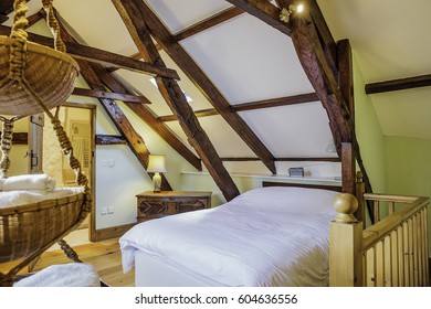 Interior Shot Of A Log Cabin Hotel Room. 