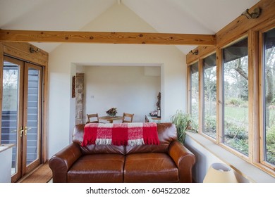 Interior Shot Of A Log Cabin Living Room.