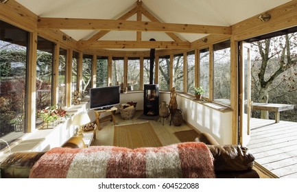 Interior shot of a log cabin living room.