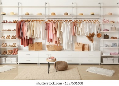 Interior Of Show Room With Stylish Clothes And Accessories