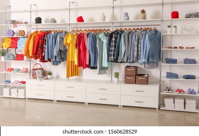 Interior Of Show Room With Stylish Clothes And Accessories