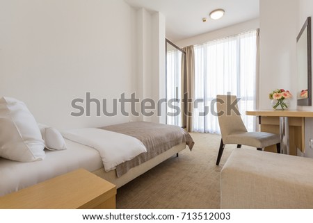 Interior of a single bed  hotel bedroom