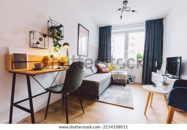 Interior of small apartment living room\
for home office. Real estate rent and home\
staging