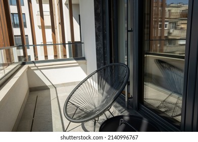 Interior Of A Small Apartment Terrace With Chairs