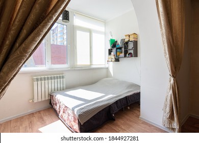 The interior of a spacious loggia in an apartment building on which a sleeping place is located - Shutterstock ID 1844927281