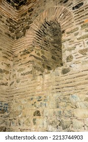 Interior Stone And Brick Wall Inside Ancient Castle Ruins.