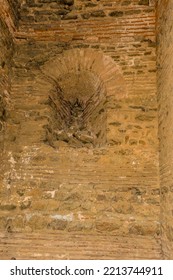 Interior Stone And Brick Wall Inside Ancient Castle Ruins.