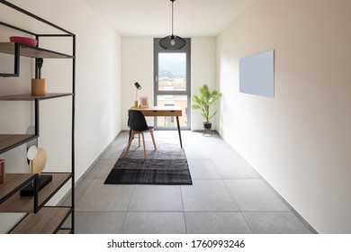 Interior study or home office with table and chair. Minimalist but nice decor.