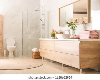 Interior of stylish bathroom with shower unit - Shutterstock ID 1628662924