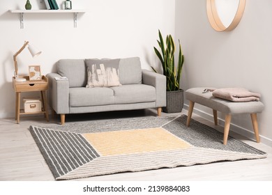 Interior Of Stylish Living Room With Sofa And Carpet