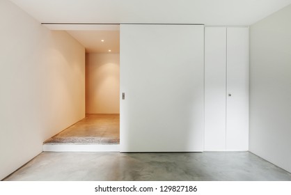 Interior of stylish modern house, bright wide room