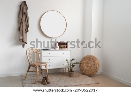 Interior of stylish room with mirror
