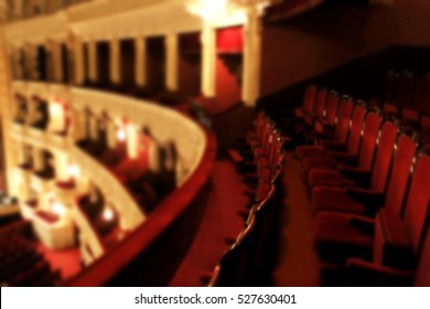 The interior of the theater arts. The auditorium with seats and balcony. Soft focus