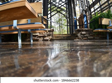 Interior Of The Thorncrown Chapel In Eureka Springs, Arkansas. View Of The Ground And Pews Facing The Front. Picture Taken On October 18th, 2020 Following A Church Service.