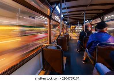 Interior Of A Tram Car Running Through Downtown District Of Hong Kong City At Night