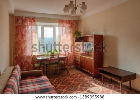 Interior of typical soviet style apartment. Old furniture and retro design
