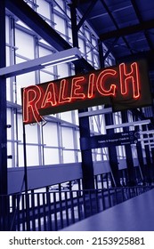 The Interior Of Union Station Train Depot In Raleigh, NC, With A Neon Raleigh Sign