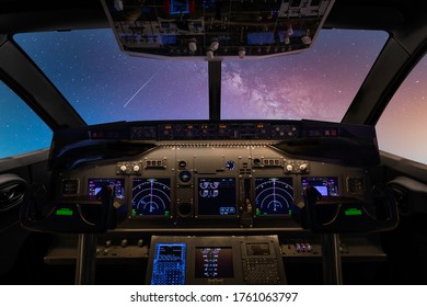 Interior View Of Aircraft Control Unit In The Cockpit Of Modern Passenger Airplane Against Starry Night 