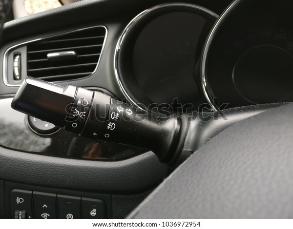 Interior view of car with black salon , close up\
on lights commands