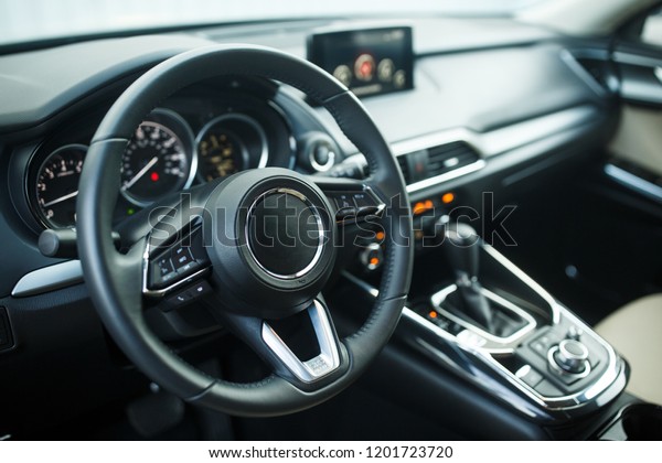 Interior view of\
car with black and silver \
salon