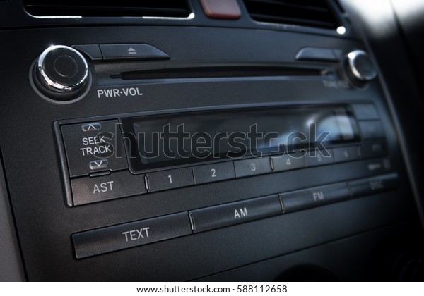 interior view of a car\
dashboard and dials