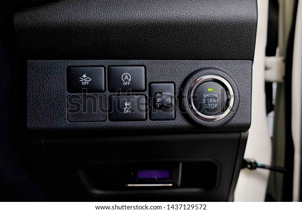 Interior view of car include Push start button and\
others control button