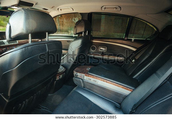 Interior view of car\
with leather salon. View of the interior of a modern automobile\
showing the dashboard