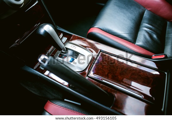 Interior view of car\
with leather salon. View of the interior of a modern automobile\
showing the dashboard.