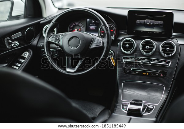 Interior view of car, luxury car
steering wheel and dashboard with display or monitor
screen.