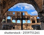 Interior view of the Colosseum in Rome, Italy: the cross in the center.