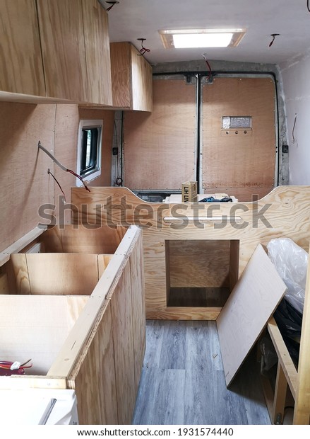 Interior view\
of a conversion van into a camper\
van
