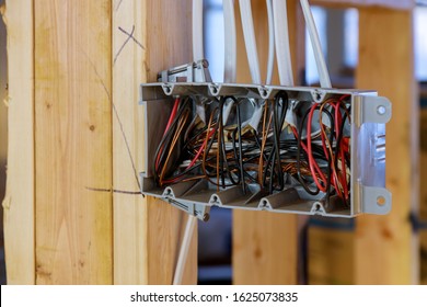 Interior View Of A Electrical Box With Wiring In A Wooden Beams New Home Under Construction