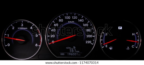Interior View of the modern business car. Close up\
shot of a speedometer in a car. Modern car interior dashboard and\
steering wheel