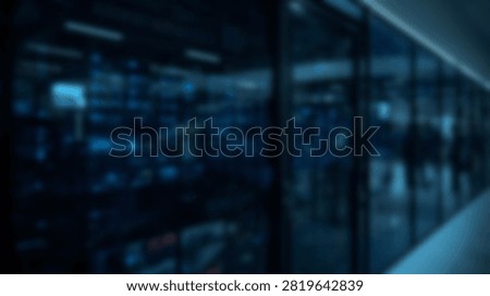 Interior view of a modern data center with rows of illuminated server racks and blinking lights, representing technology and connectivity.