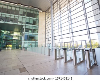 Interior View Of Modern Office Lobby With Security Check Barriers