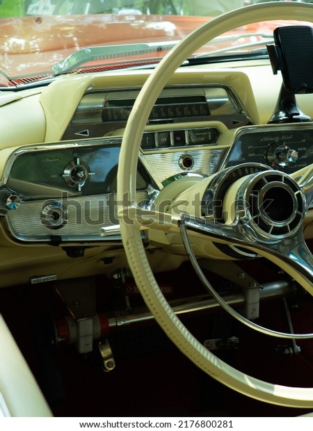 Interior view of old vintage car. View on dashboard
of classic car.