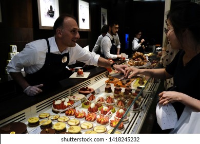 Interior View Of Pastry Shop Of French Famous Pastry Chef Pierre Hermé In Central Paris Of France On April 19, 2019.