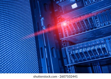 An interior view of a server rack showcasing blue light reflections. 