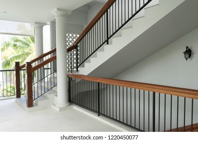 Interior View Of Staircase In Colonial Building.