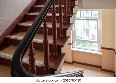 Interior View Of Stairway And Sunlight Through Window.